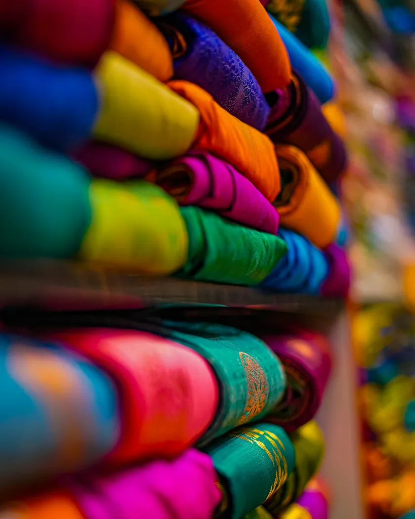 Shelves of brightly coloured fabric